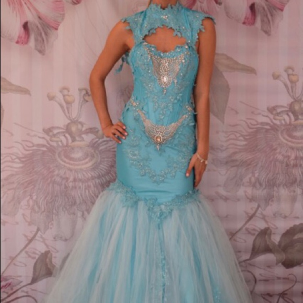 Turquoise gown. Brand new. Taking offers